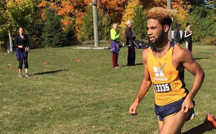 Jake Thomson running in Humber team uniform