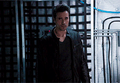 Brett Dalton acting with a wind machine blowing at him