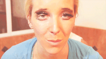 Jenna Marbles wearing funny makeup and misplaced fake eyelashes