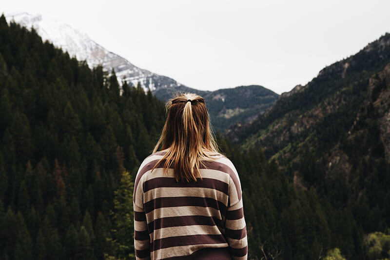 Girl overlooking mountains