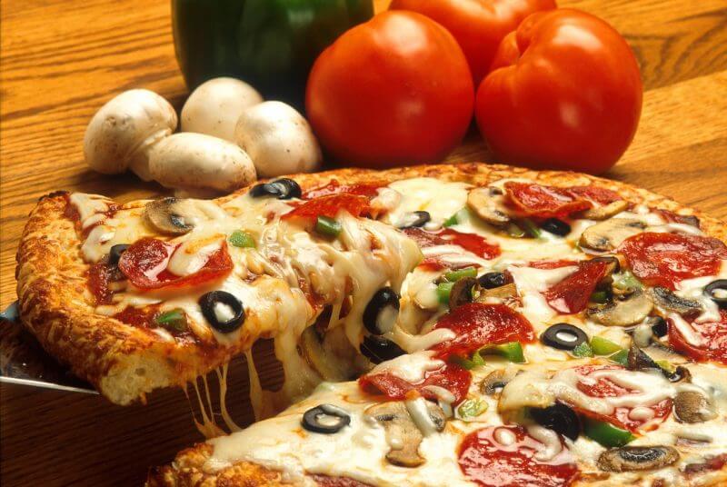 Pizza being served