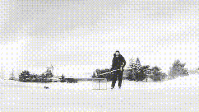 Hockey Player Sprays Ice into the Camera