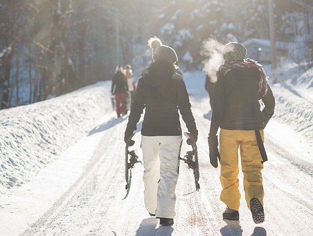 People outside, snowshoeing 