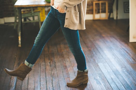 Woman walking inside house