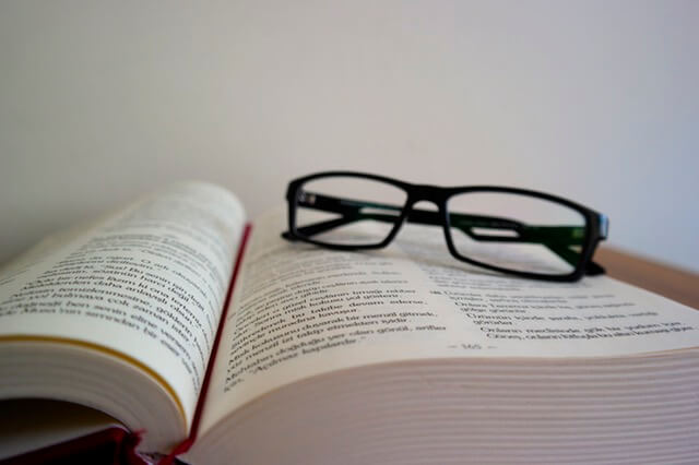 Glasses on book