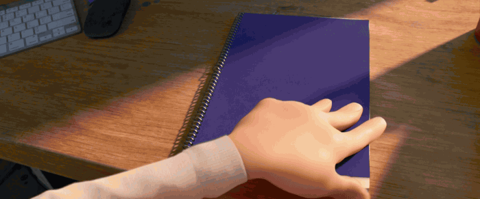 Hand with pencil about to write on paper
