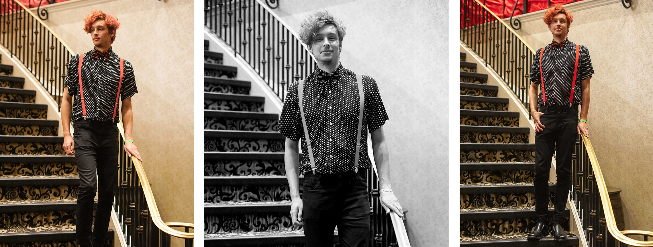 Student, Adam, poses on the stairs wearing suspenders