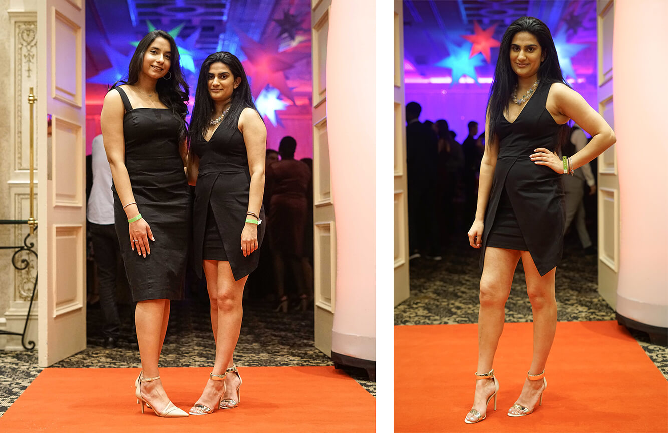 2 girls in dresses pose at Gala