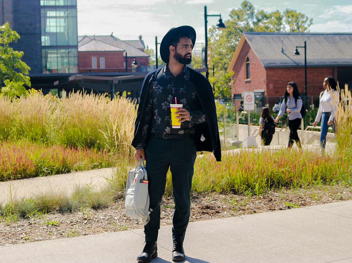 Lakeshore student poses on sidewalk