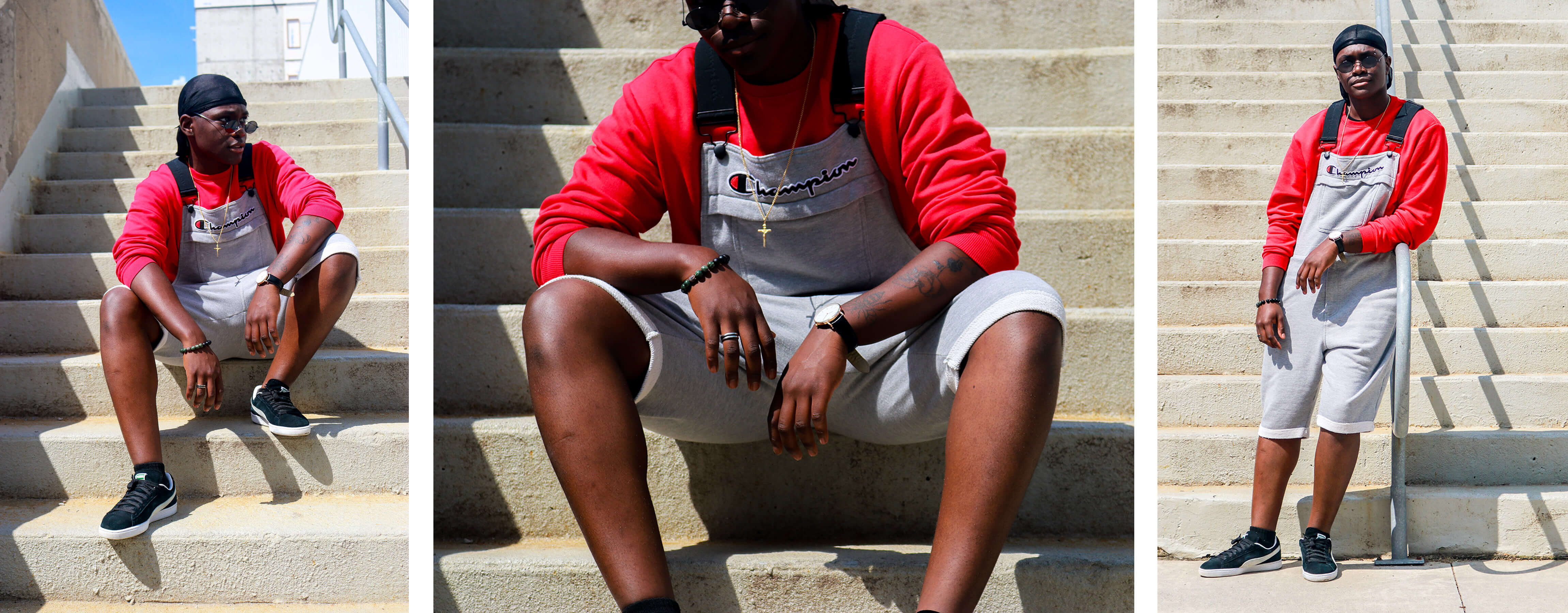 Student wearing overalls sits on stairs