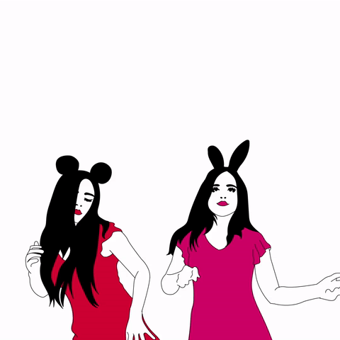 Two girls dance in a mouse and rabbit costume