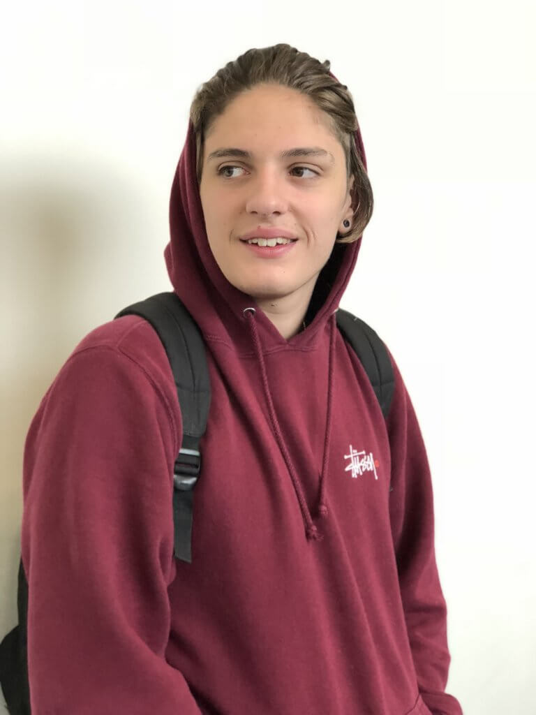 Humber student, Liam Bentley, poses for photo with backpack on.