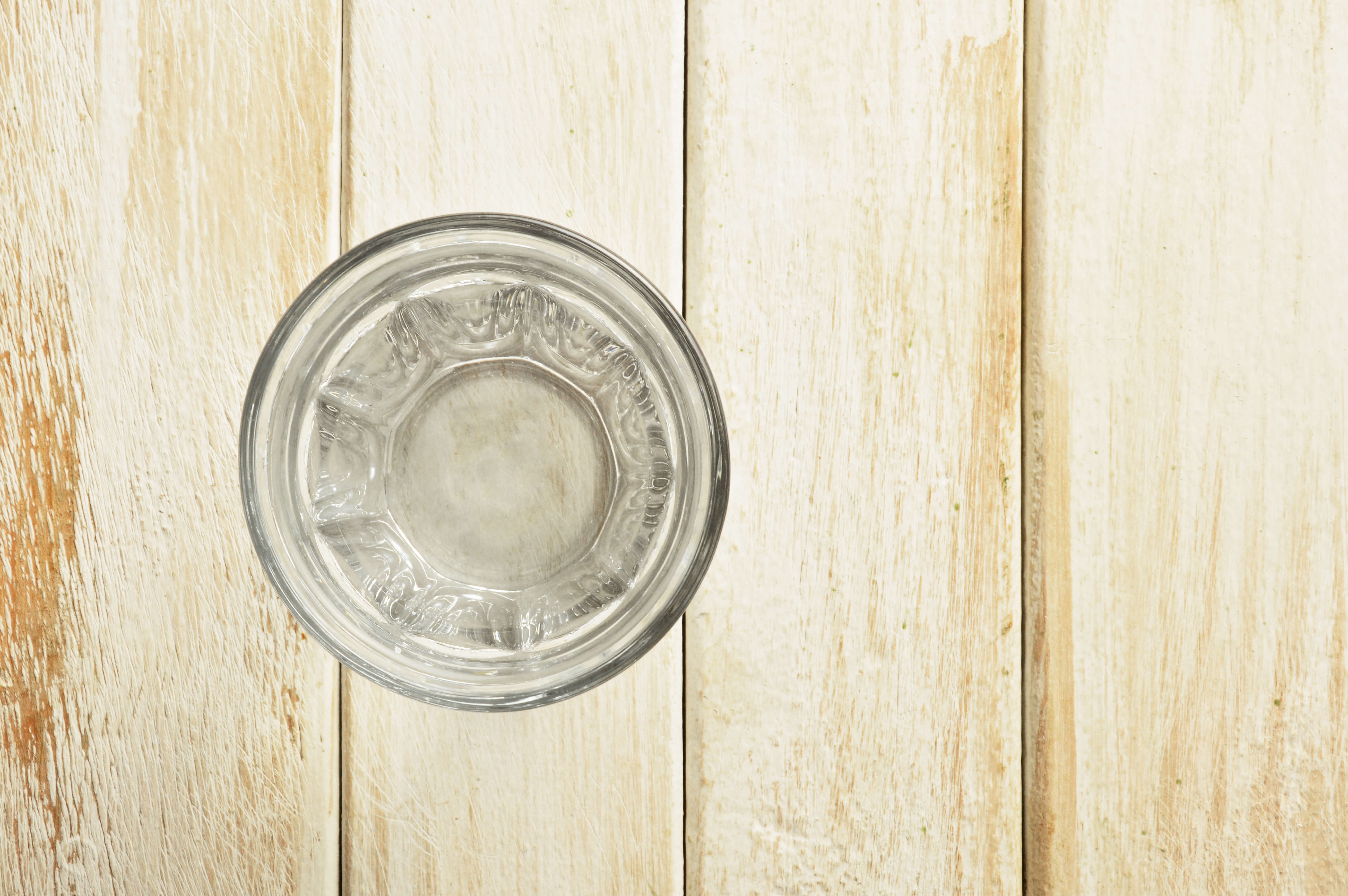 Glass of Water on Wood Table