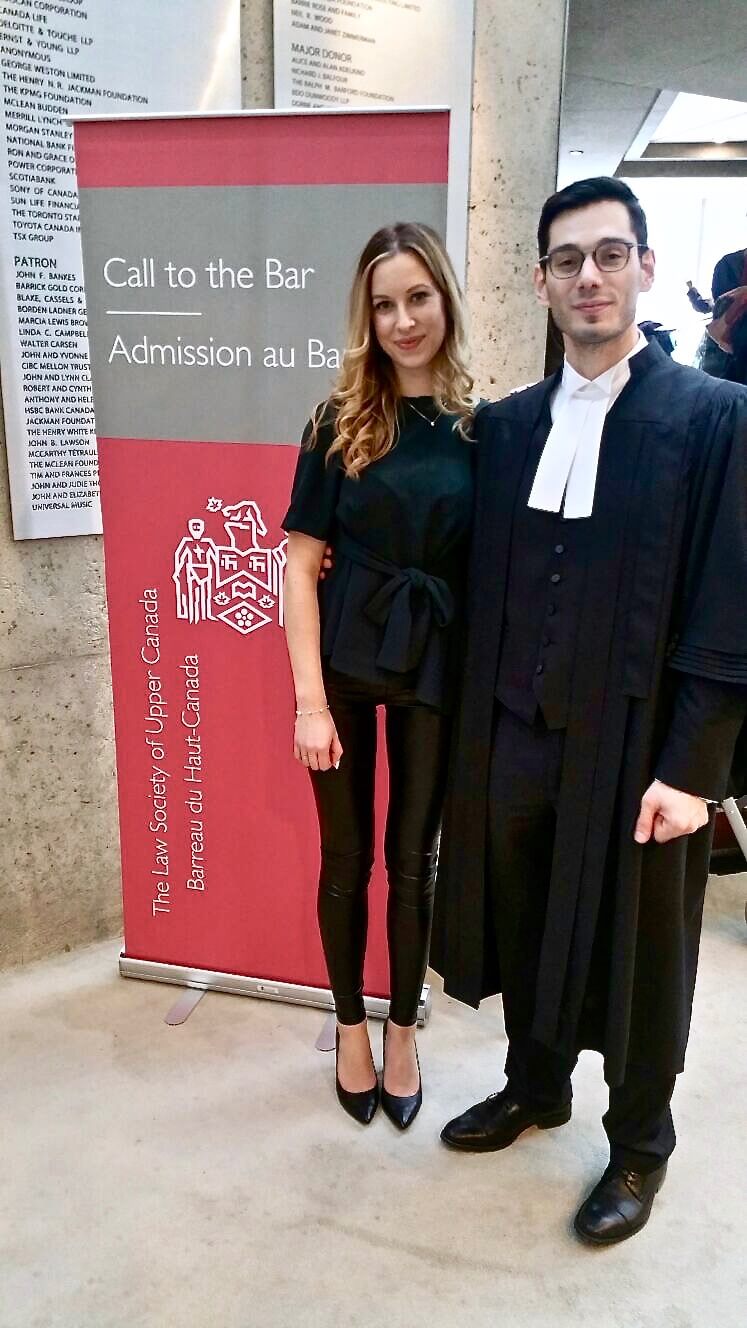 man and woman standing in front of a banner which reads Call to the Bar