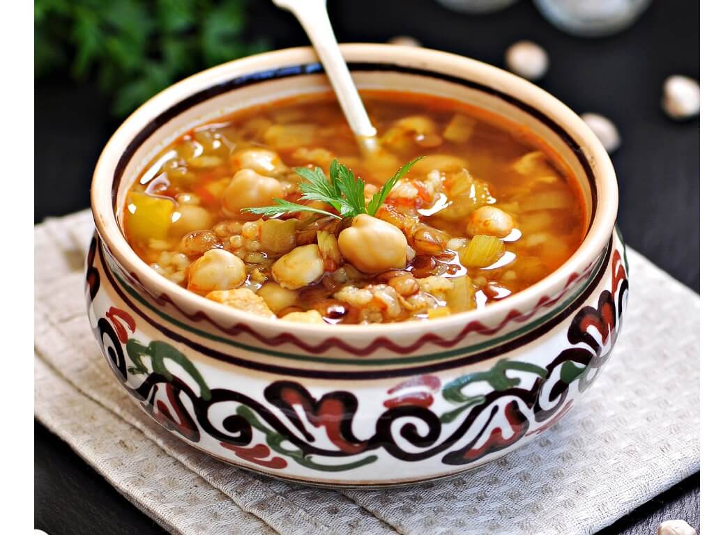 african yam soup in traditional bowl
