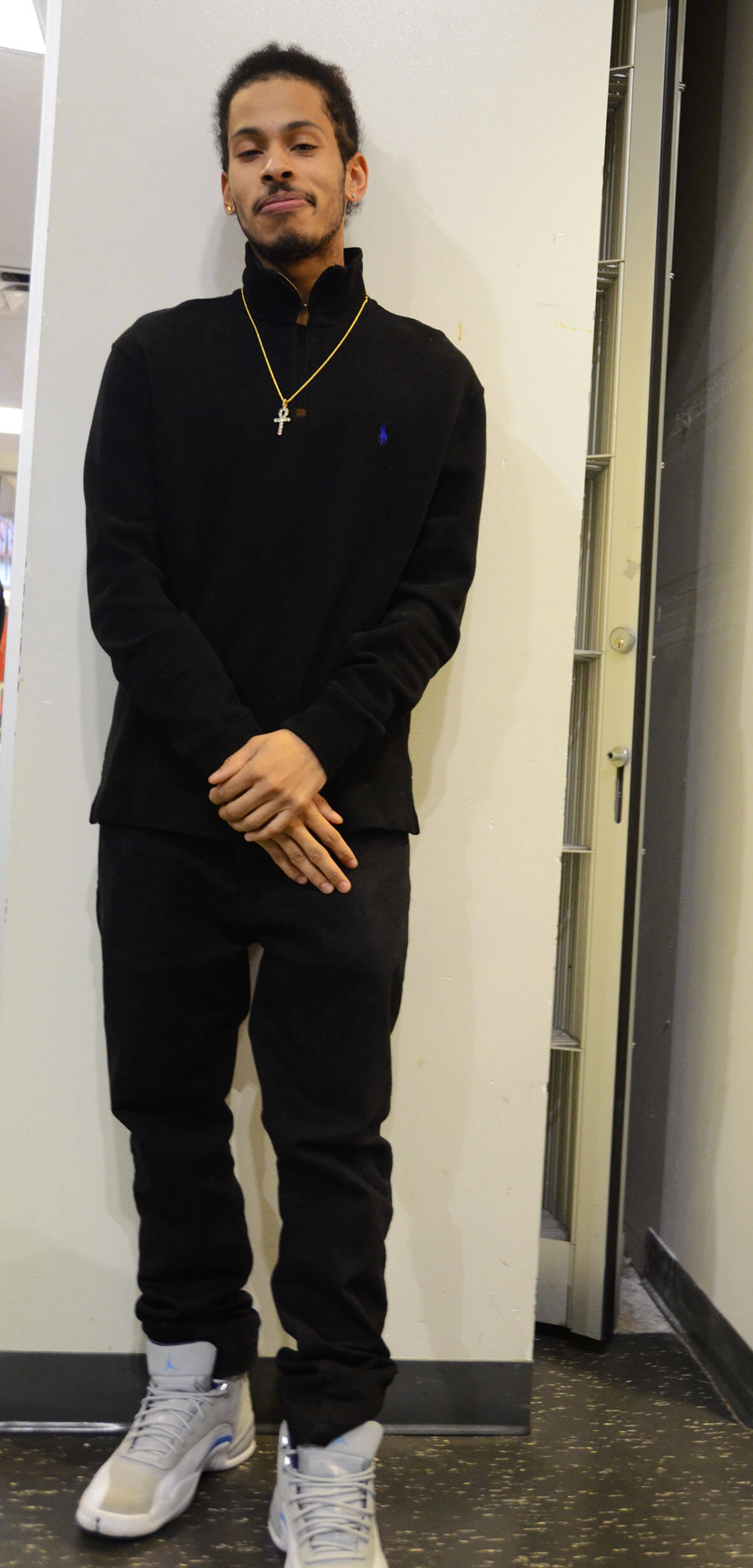 student poses for street styles