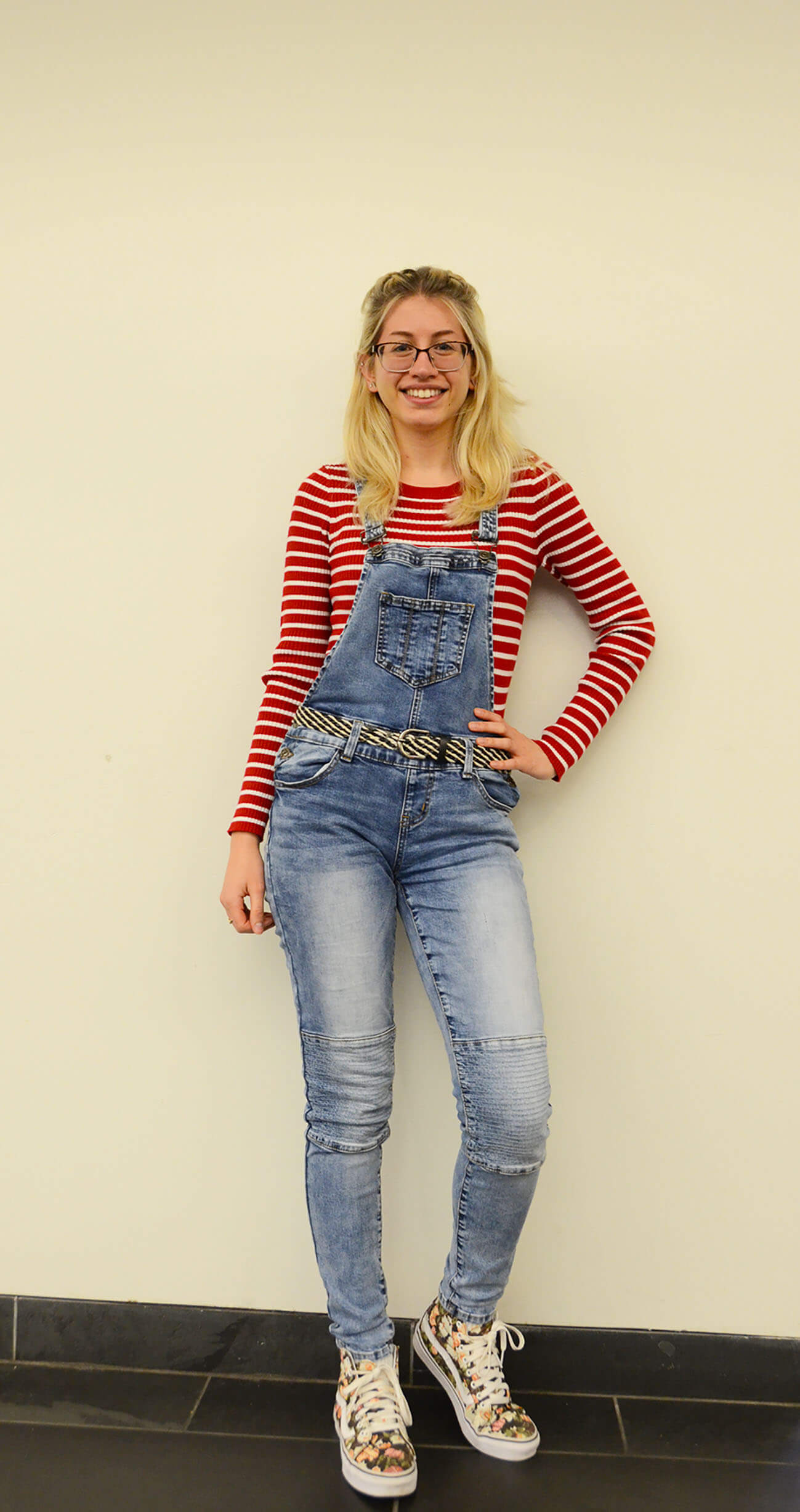 student poses for street styles