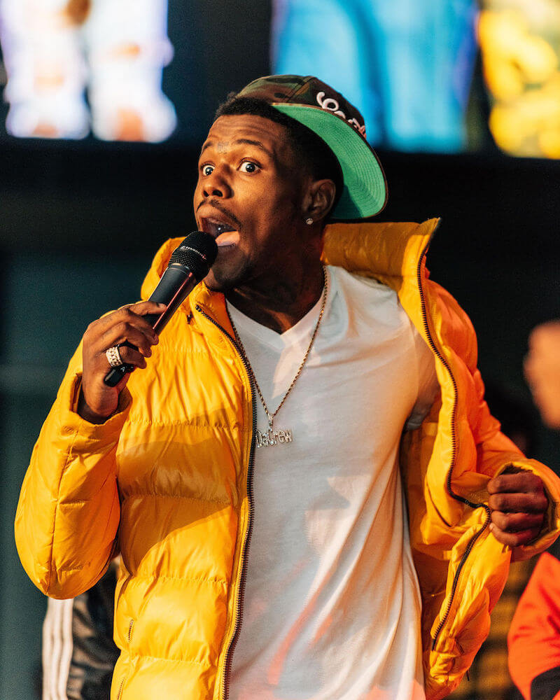 DC Young Fly Holding Microphone