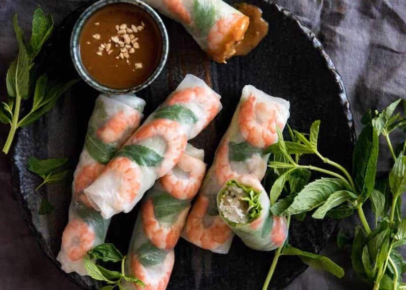 Photo of summer rolls with shrimp and peanut sauce