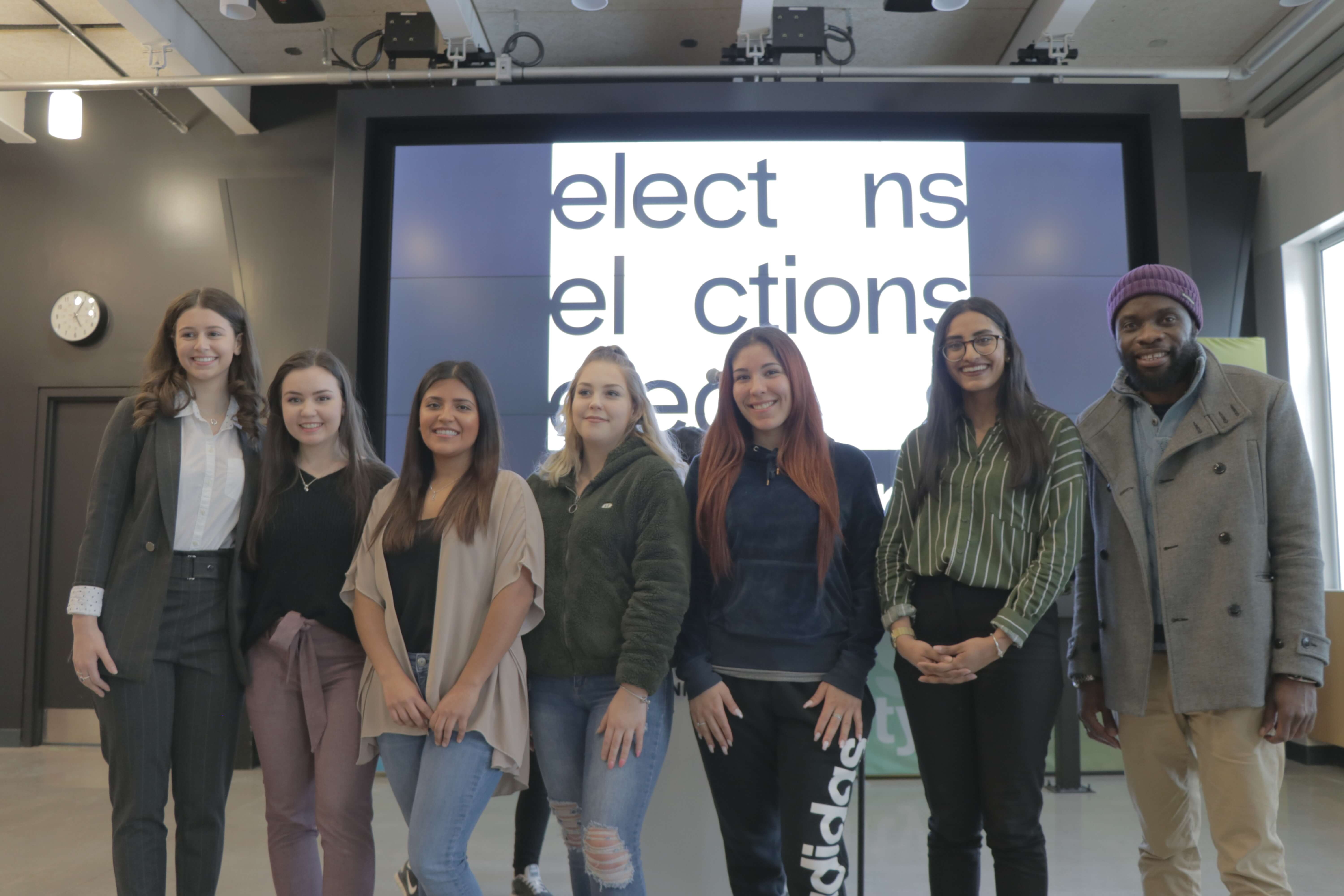The 2019-20 Board of Directors pose for a photo at the press conference