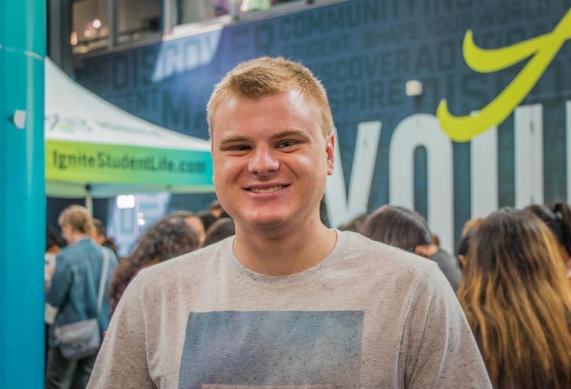boy in front of IGNITE booth