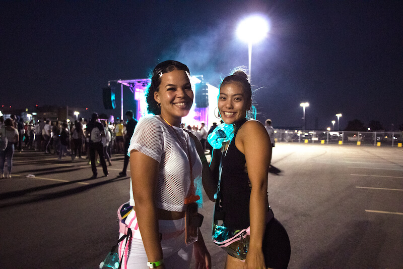 2 girls smiling in parking lot