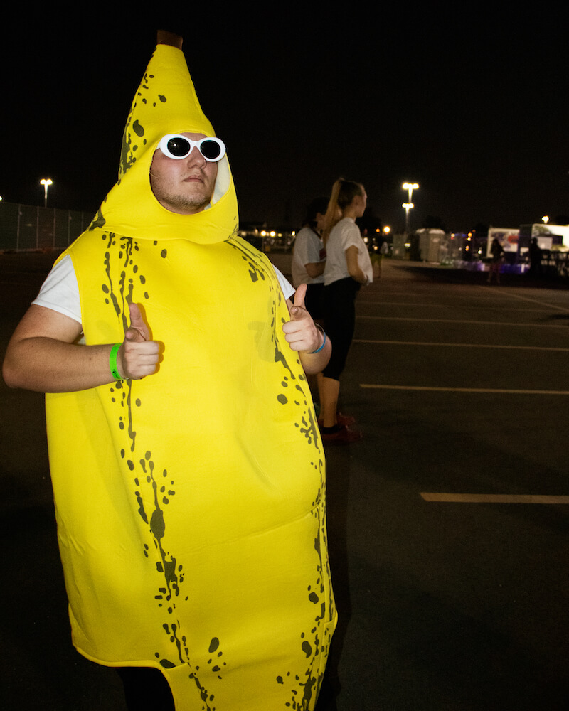 boy in banana suit holding thumbs up