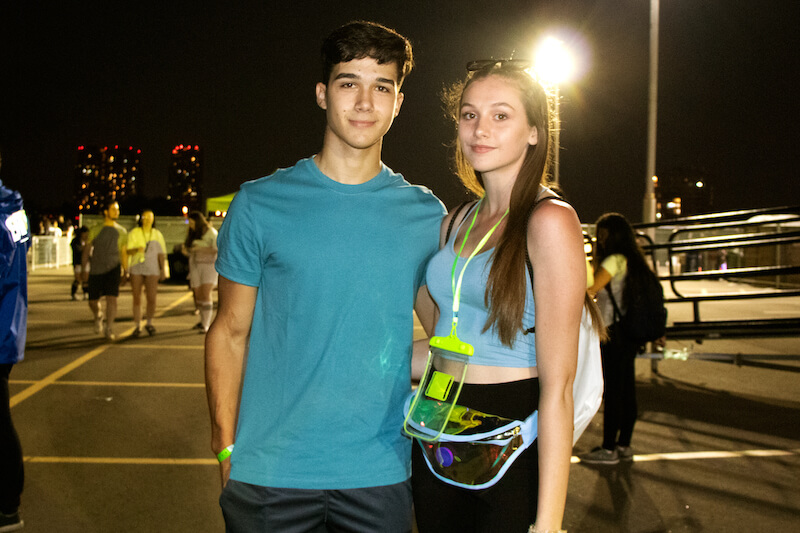 couple standing in parking lot