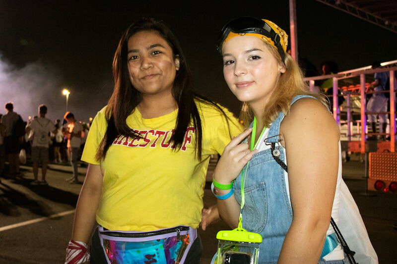 2 girls smiling in parking lot