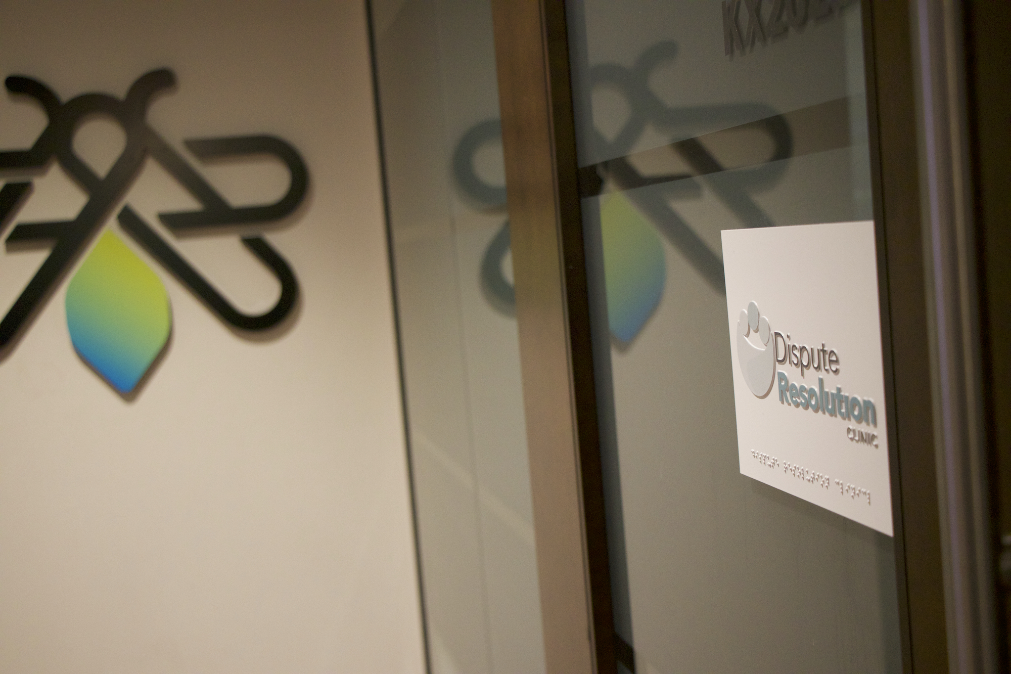 photo of dispute resolution clinic with IGNITE logo in background