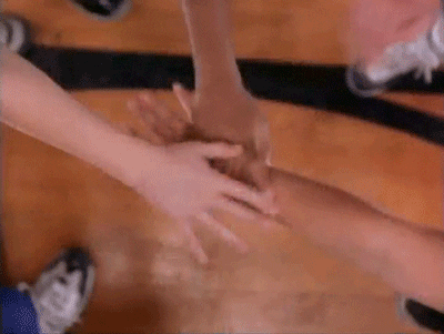 Hands together with a dog paw