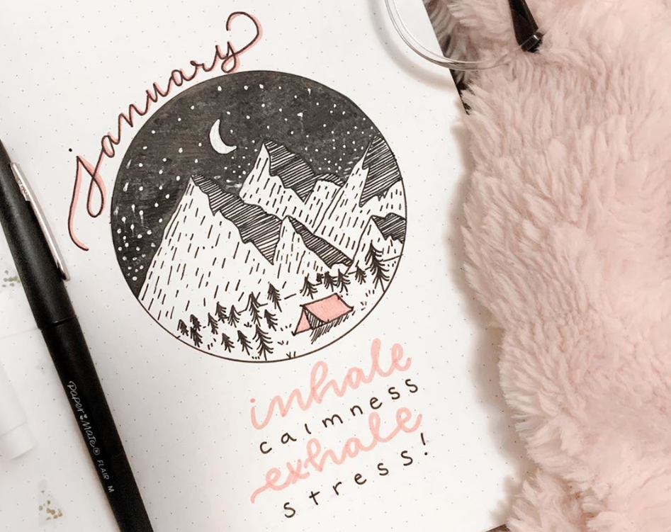 Bullet journal with mountains for the month of January