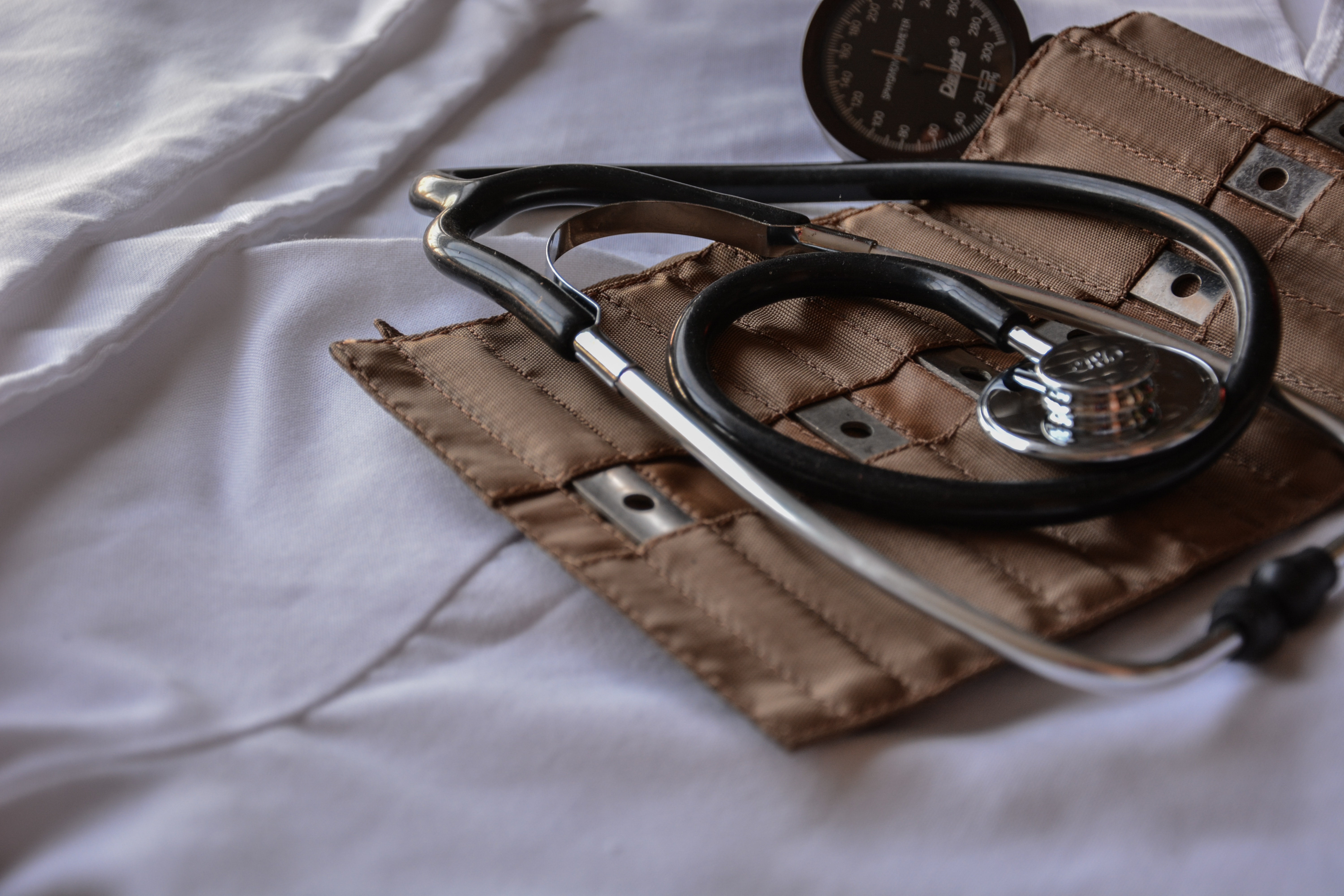 Stethoscope on a white blanket