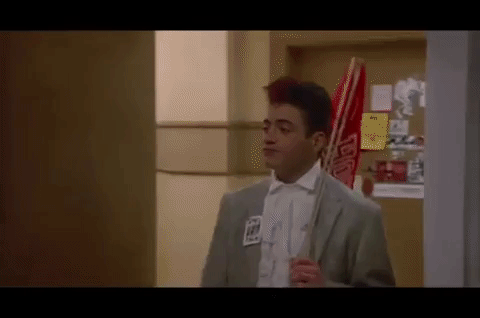 Keith Gordon in, "Back to School" (1986) enters into a spacious dorm room.