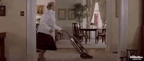 Mrs. Doubtfire dancing while vacuming