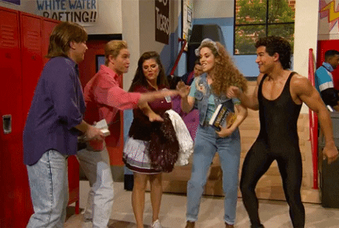 Gif from a skit on, "The Tonight Show Starring Jimmy Fallon," featuring a group of five individuals putting their hands together and then lifting their hands up while shouting, "Teamwork!"