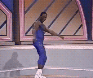 TV areobics class with man doing a dance