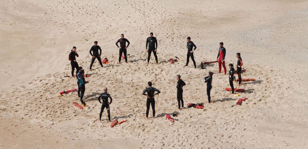 A group of people standing in a circle