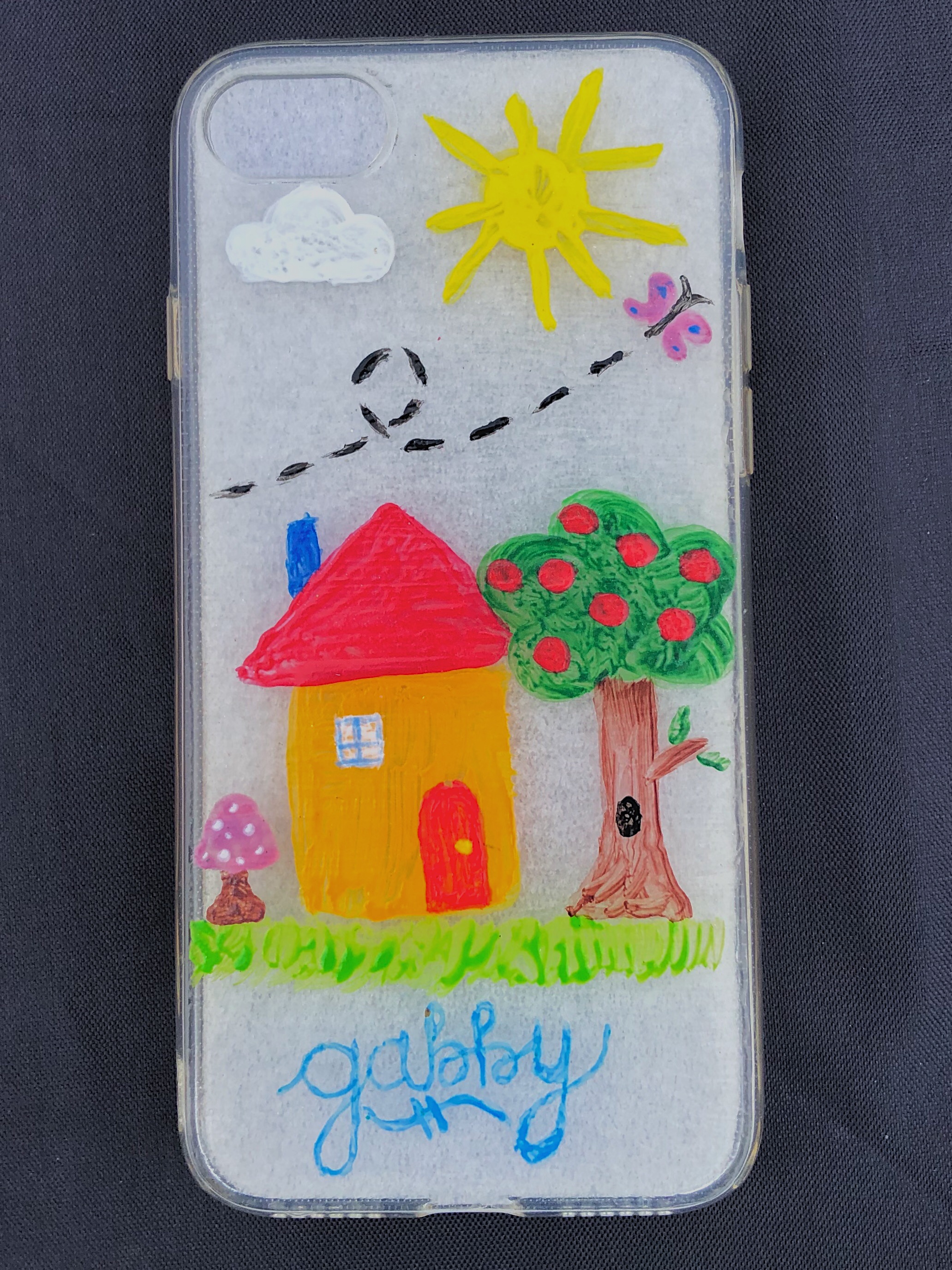 A clear phone case customized with acrylic paint.