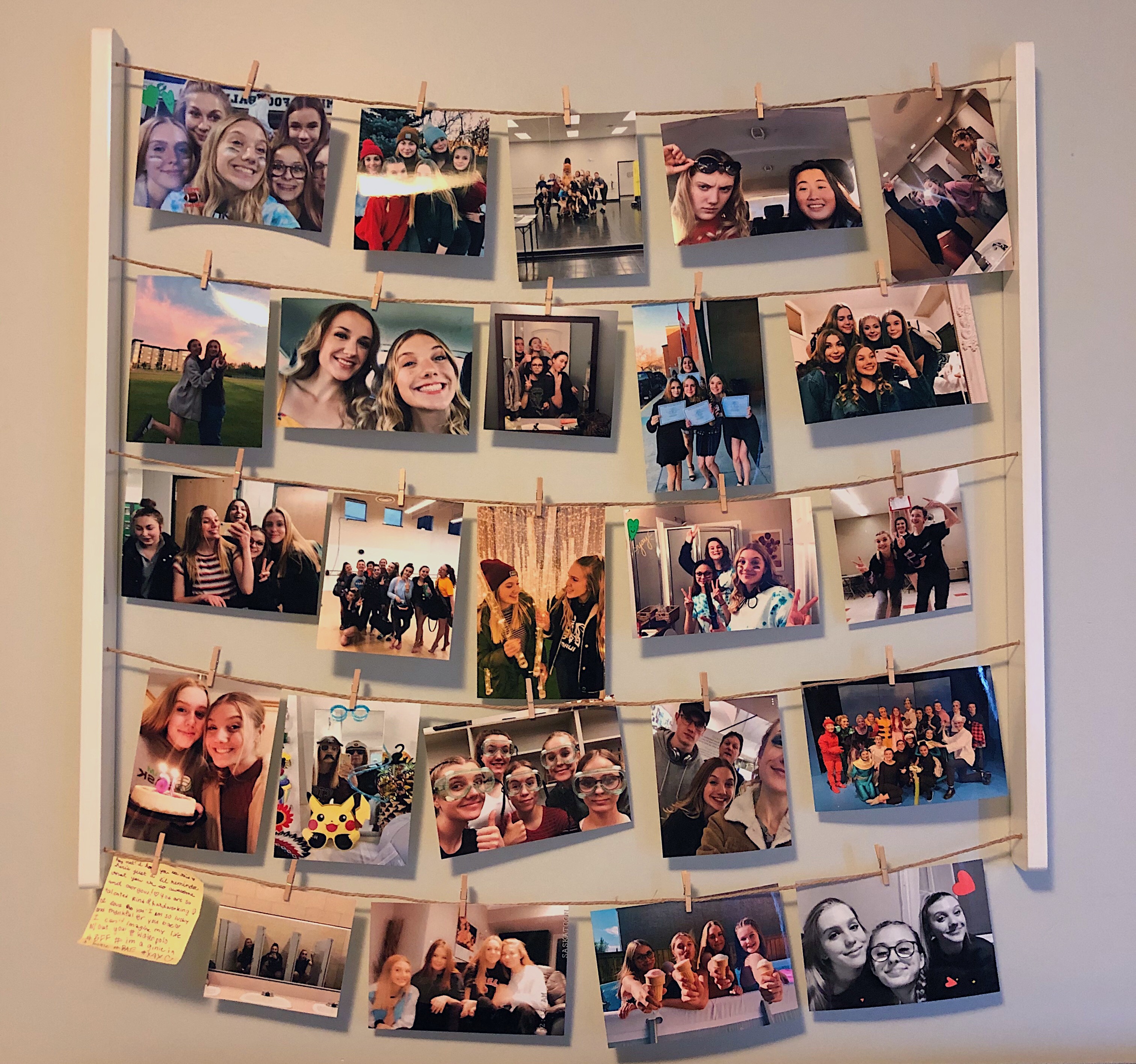 A photo collage mounted on a wall.